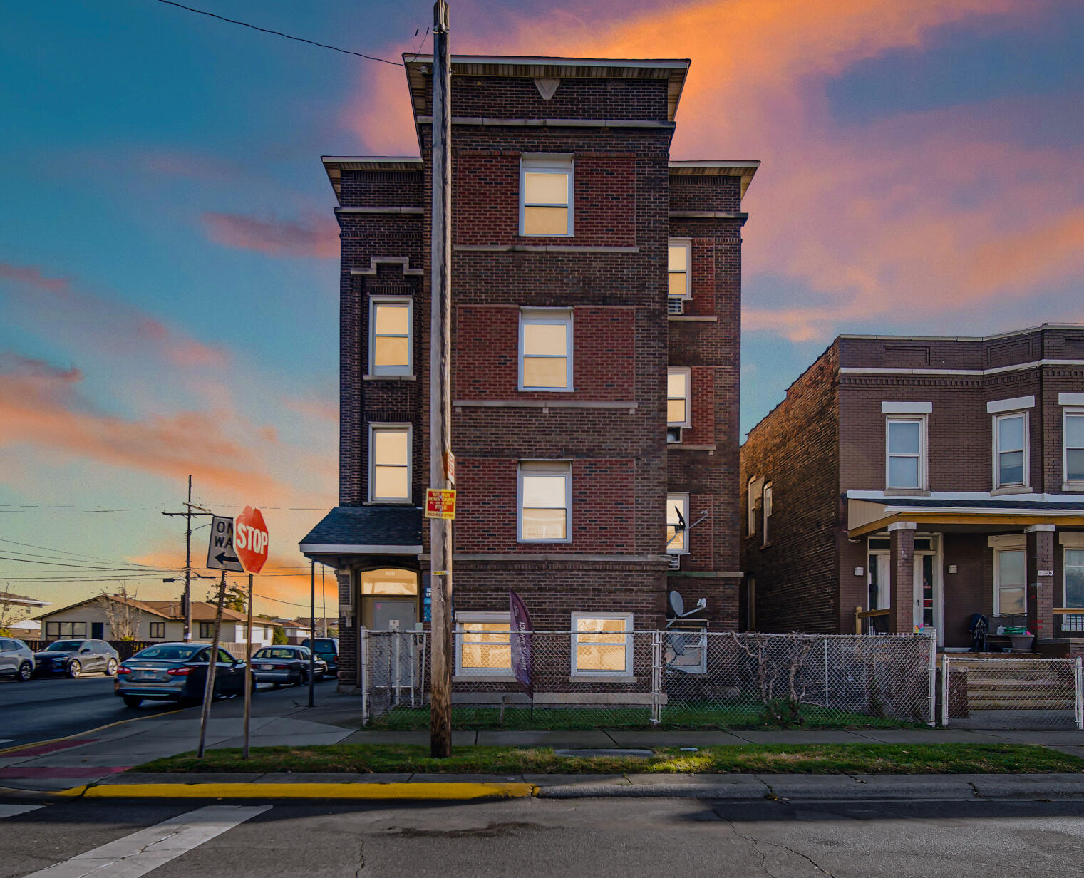 3501 Fir Street East Chicago, IN 46312 - Photo 1 of 26 a front view of a residential apartment building with a yard