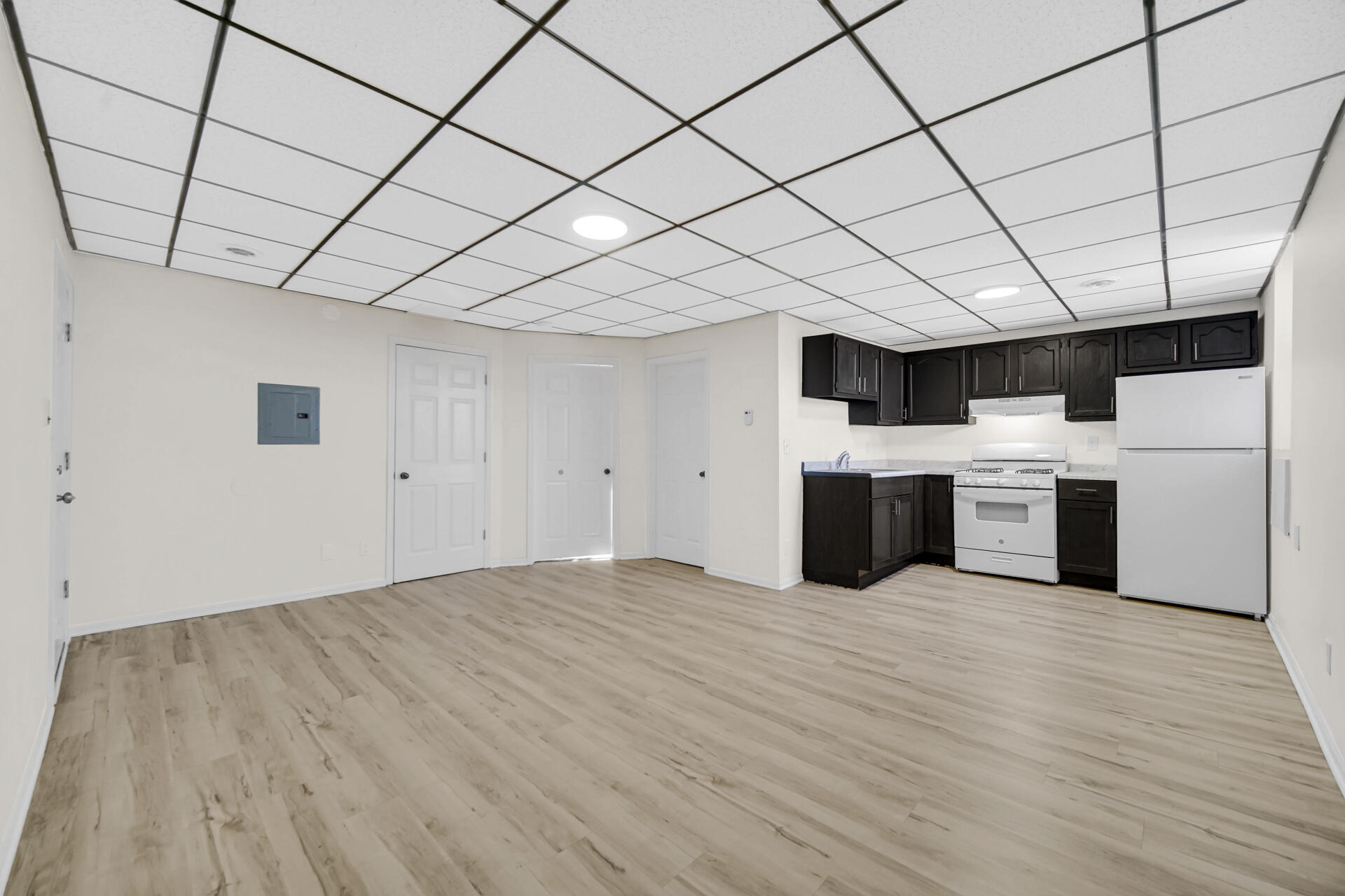 3501 Fir Street East Chicago, IN 46312 - Photo 11 of 26 a view of a kitchen with microwave and cabinets