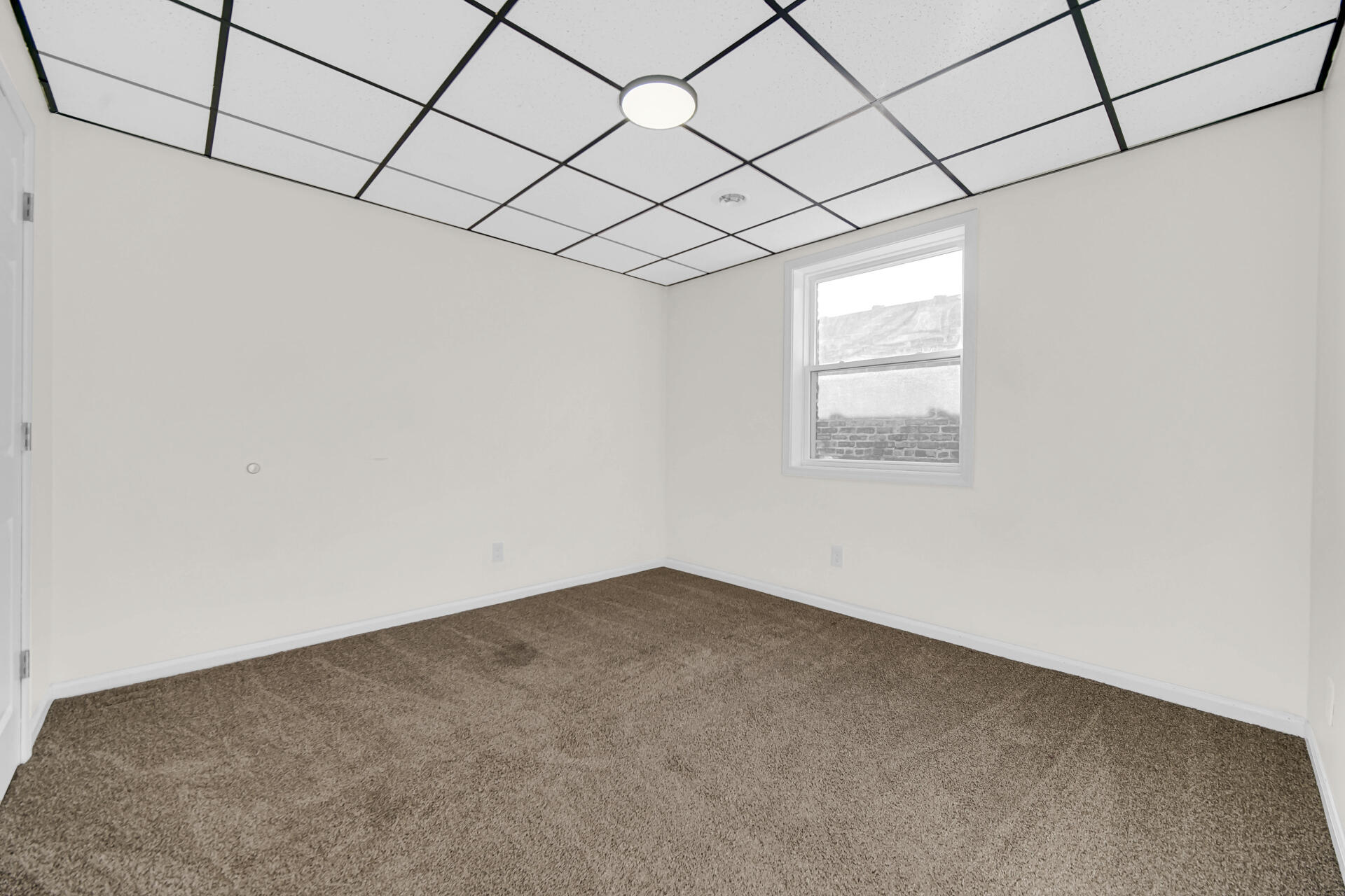 3501 Fir Street East Chicago, IN 46312 - Photo 14 of 26 an empty room with a window