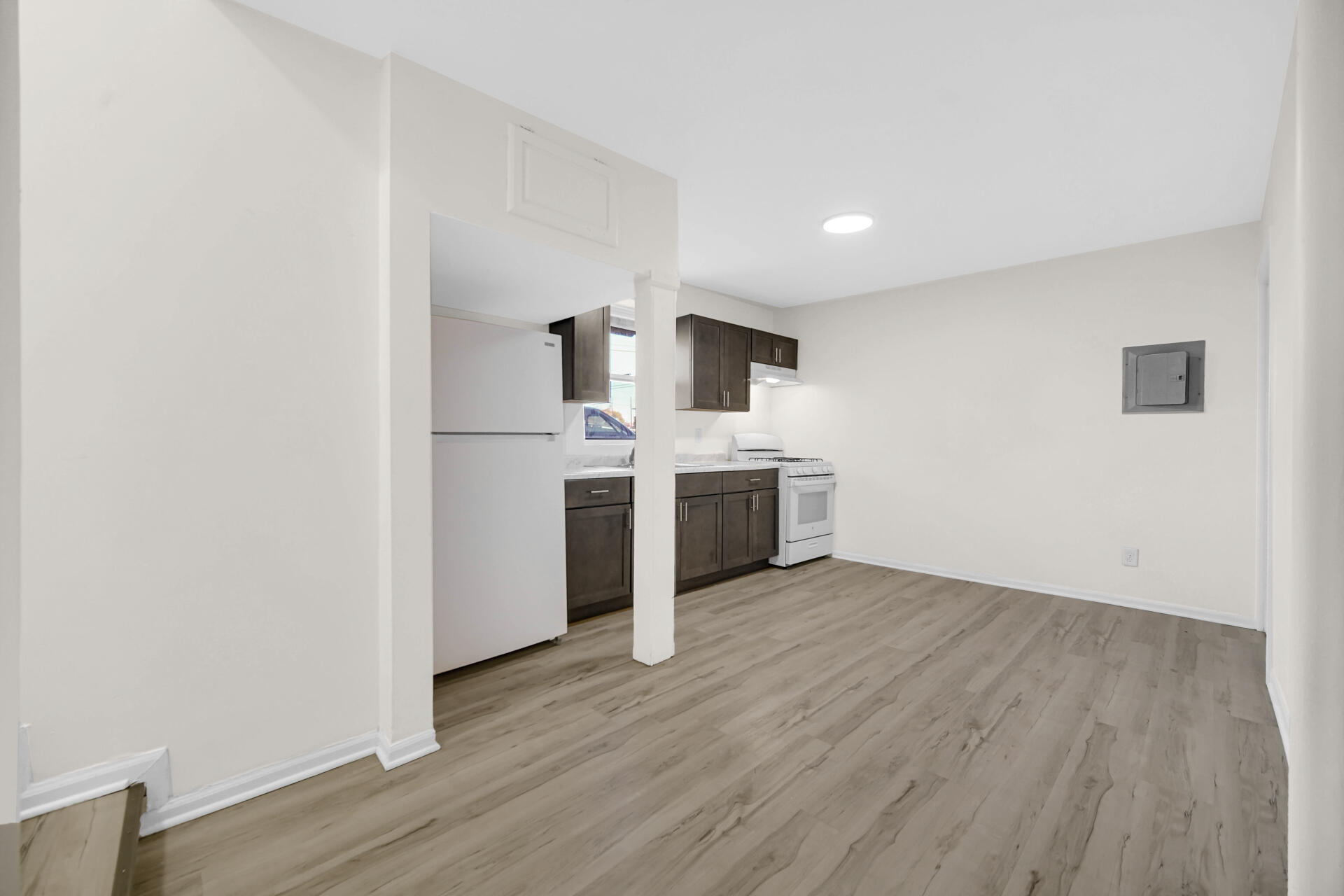 3501 Fir Street East Chicago, IN 46312 - Photo 18 of 26 a view of kitchen with wooden floor and electronic appliances