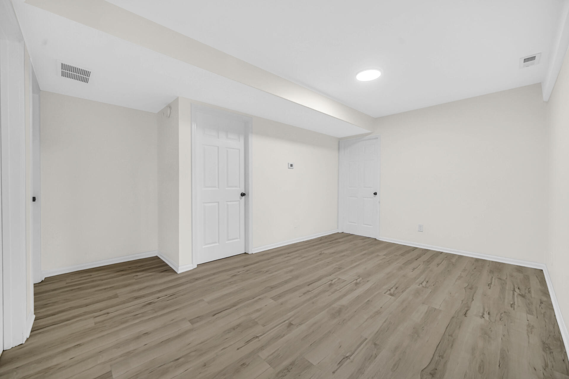 3501 Fir Street East Chicago, IN 46312 - Photo 19 of 26 a view of an empty room with wooden floor