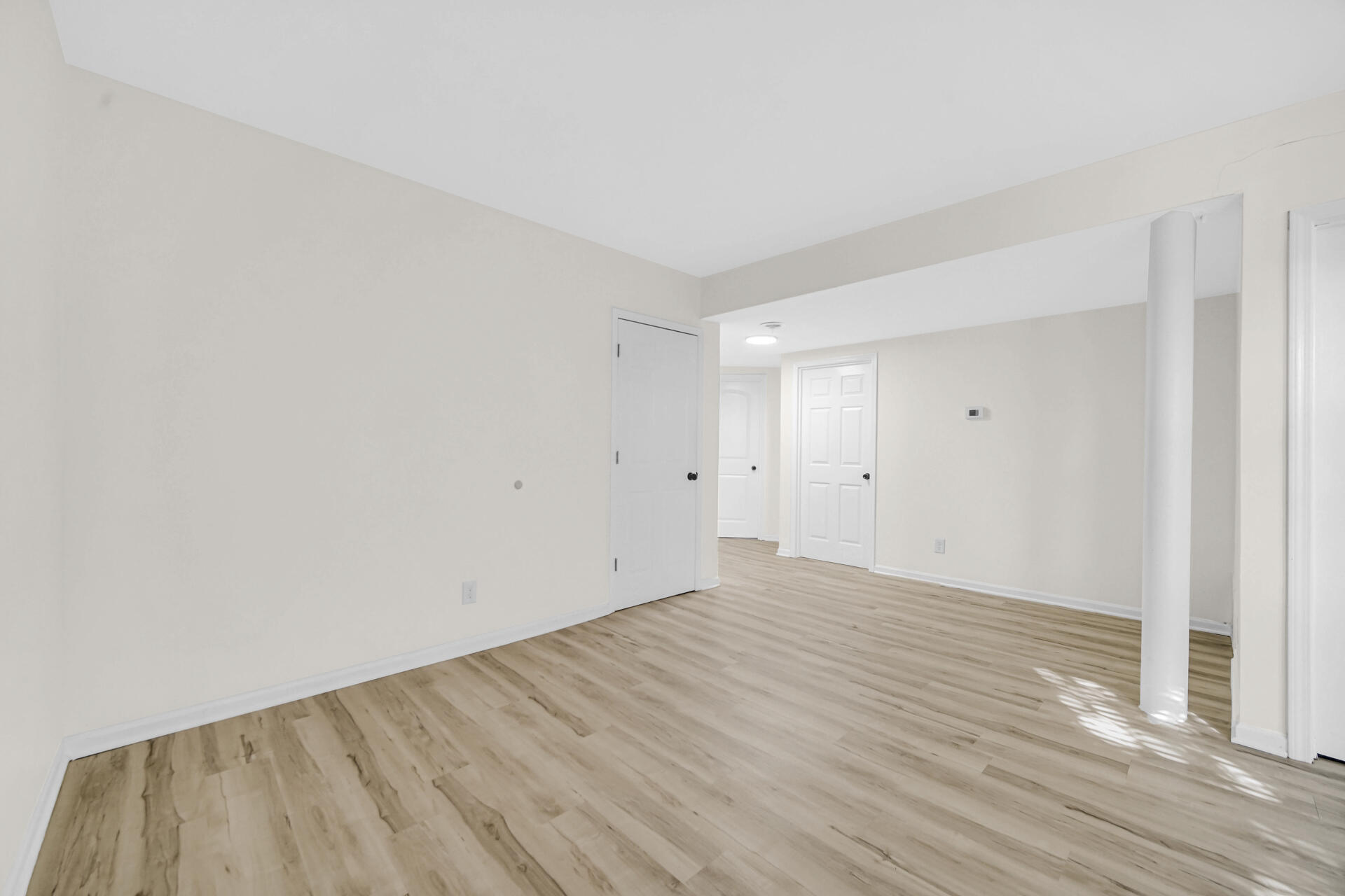 3501 Fir Street East Chicago, IN 46312 - Photo 22 of 26 a view of an empty room with wooden floor