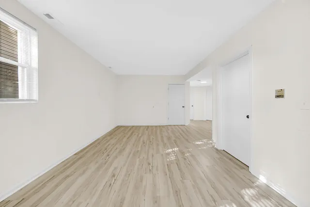 a kitchen with a stove top oven sink and cabinets