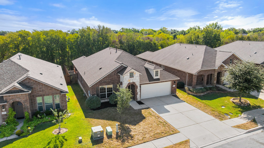 11729 Arran Street Austin, TX 78754 - Photo 1 of 1 an aerial view of a house with swimming pool and big yard