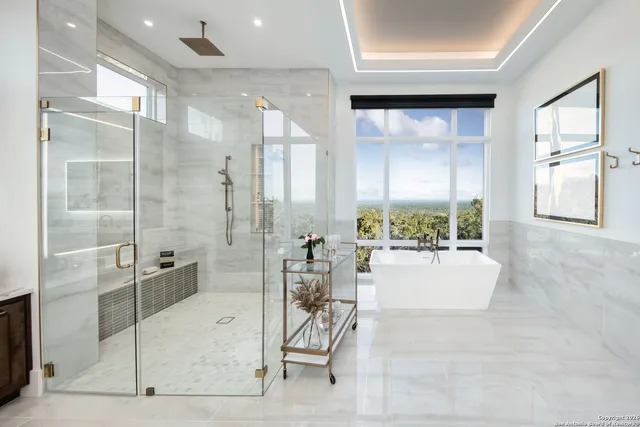 a view of a lobby with a floor to ceiling windows and living room