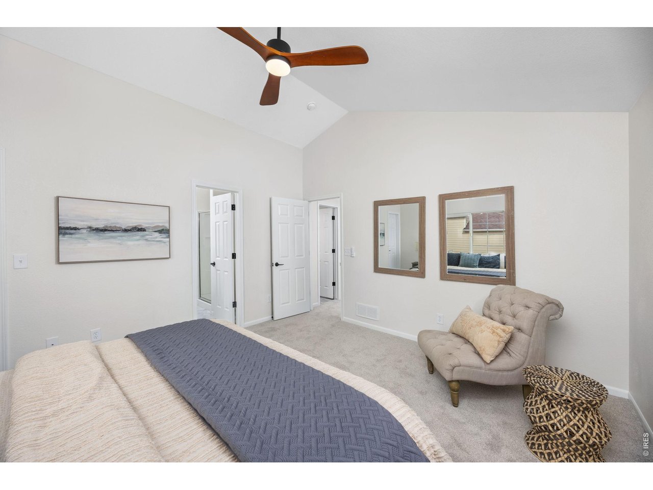 4927 30th Street Greeley, CO 80634 - Photo 19 of 35 a bedroom with a bed and a couch