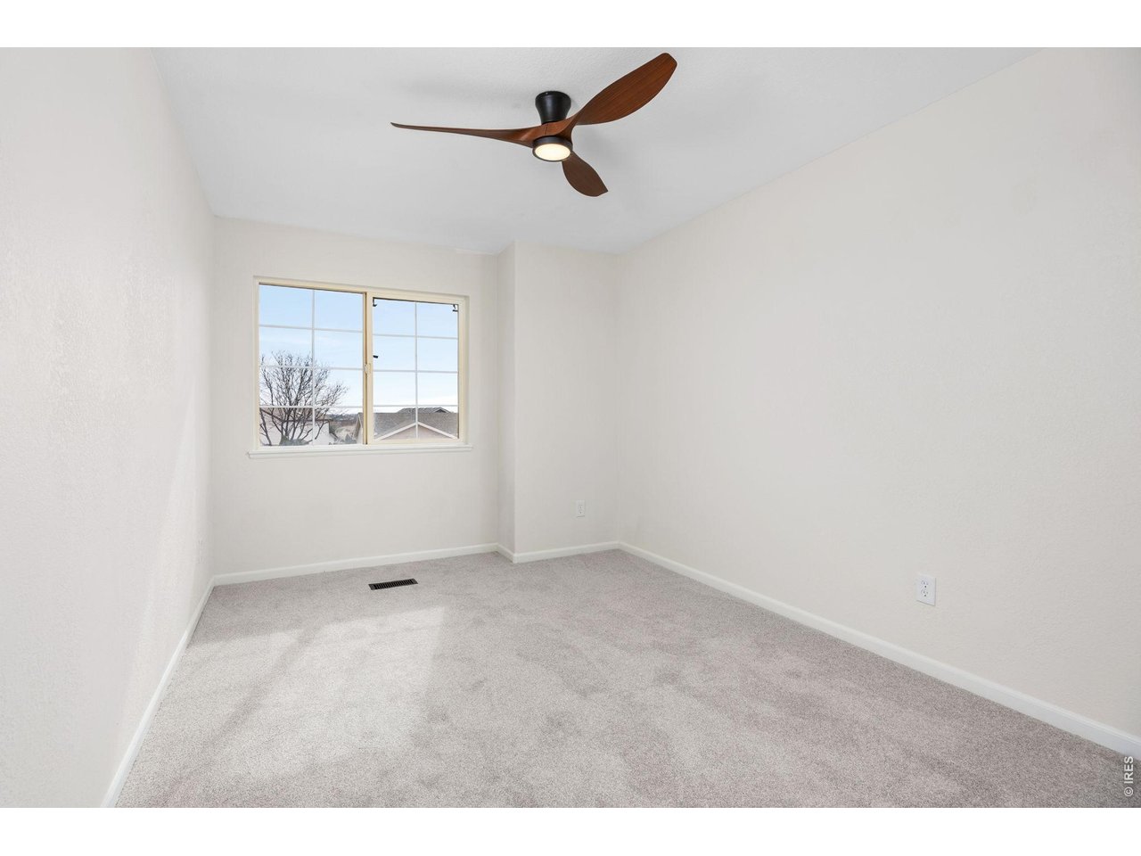 4927 30th Street Greeley, CO 80634 - Photo 20 of 35 a view of room with ceiling fan