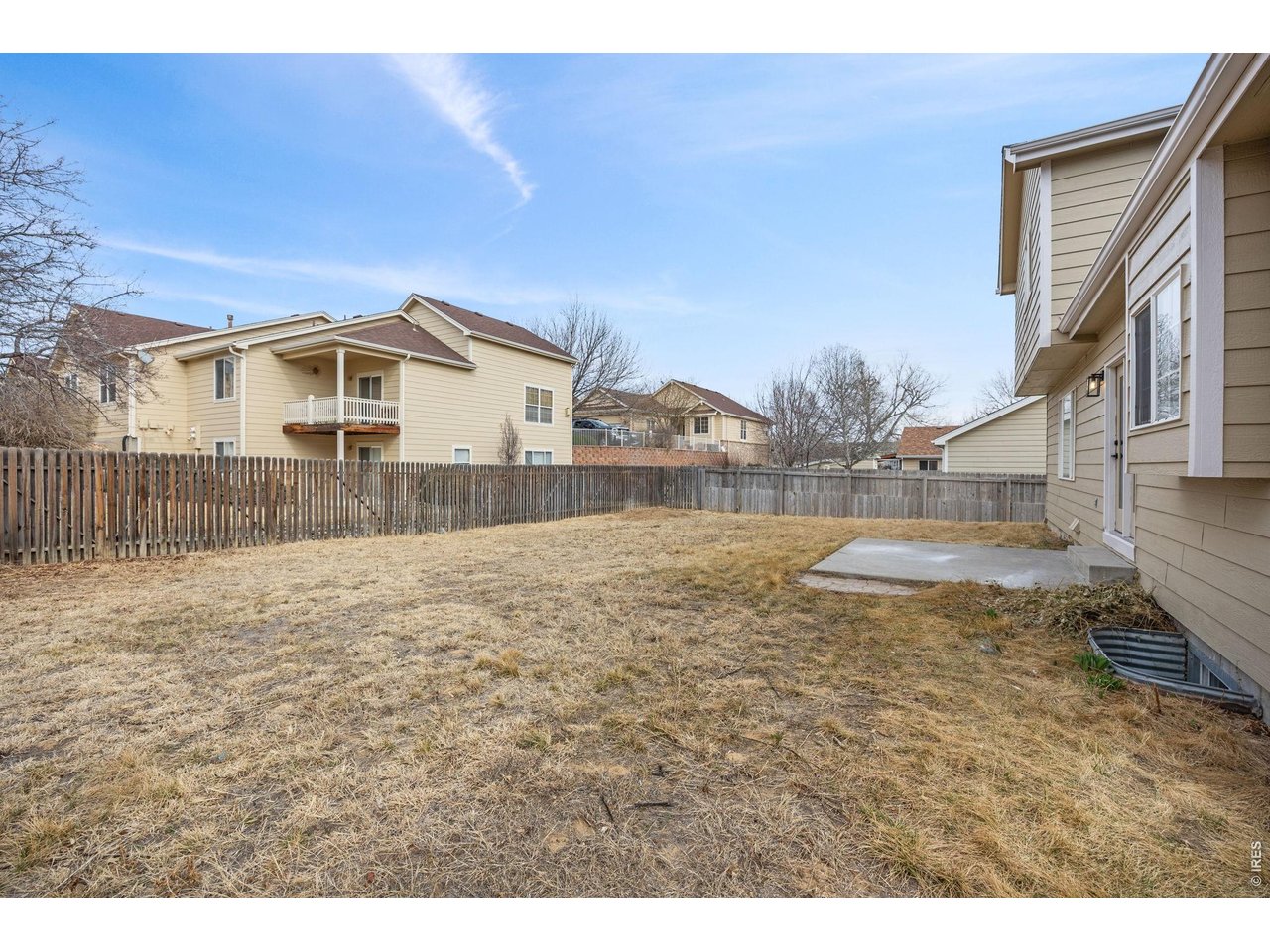 4927 30th Street Greeley, CO 80634 - Photo 28 of 35 a view of a house with a yard
