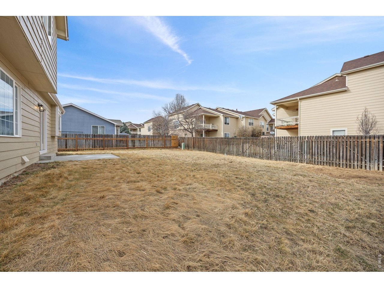 4927 30th Street Greeley, CO 80634 - Photo 31 of 35 a view of a house with a yard