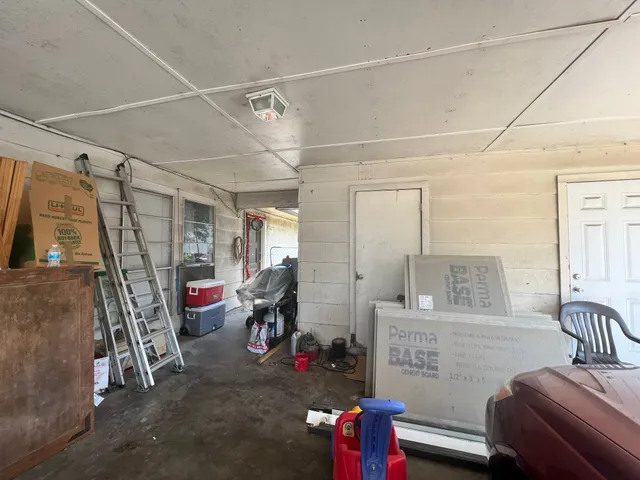 a view of a livingroom with furniture and windows