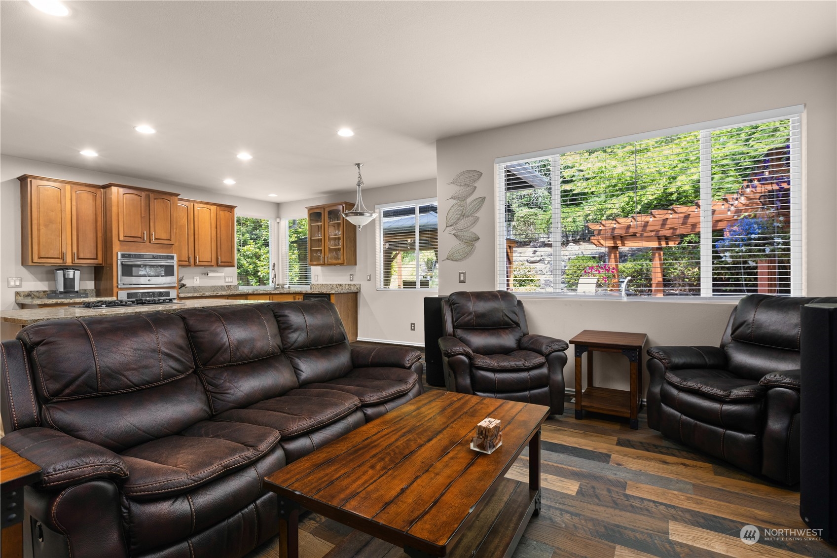 27746 Maple Ridge Way Southeast Maple Valley, WA 98038 - Photo 11 of 37 a living room with furniture and a large window