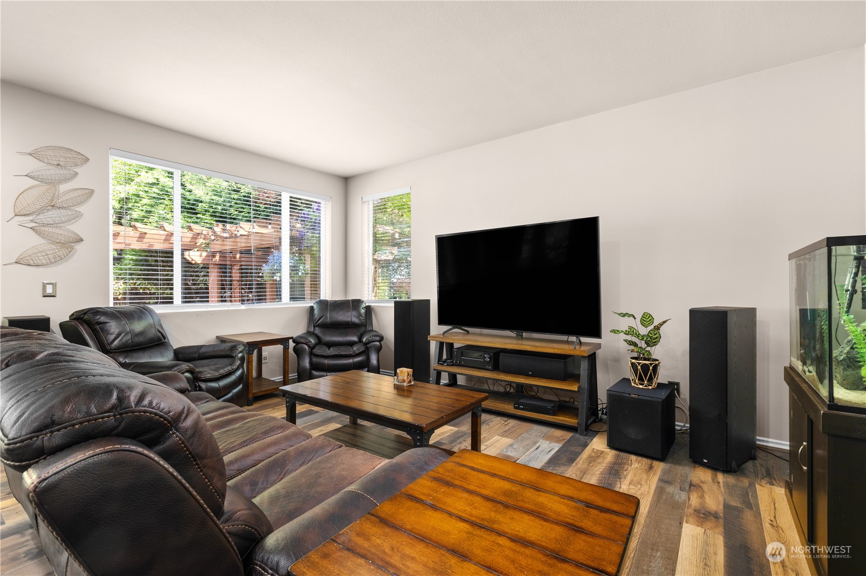 27746 Maple Ridge Way Southeast Maple Valley, WA 98038 - Photo 12 of 37 a living room with furniture and a flat screen tv