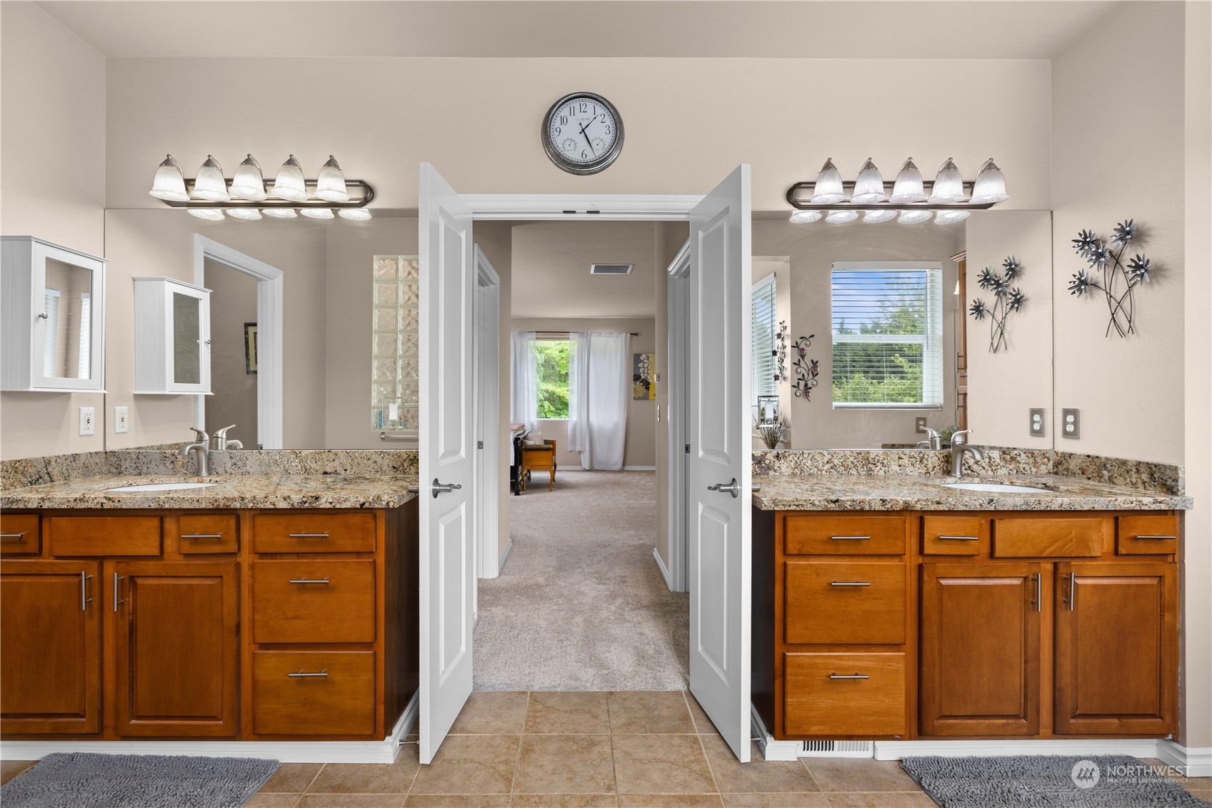 27746 Maple Ridge Way Southeast Maple Valley, WA 98038 - Photo 20 of 37 a bathroom with a sink and a mirror