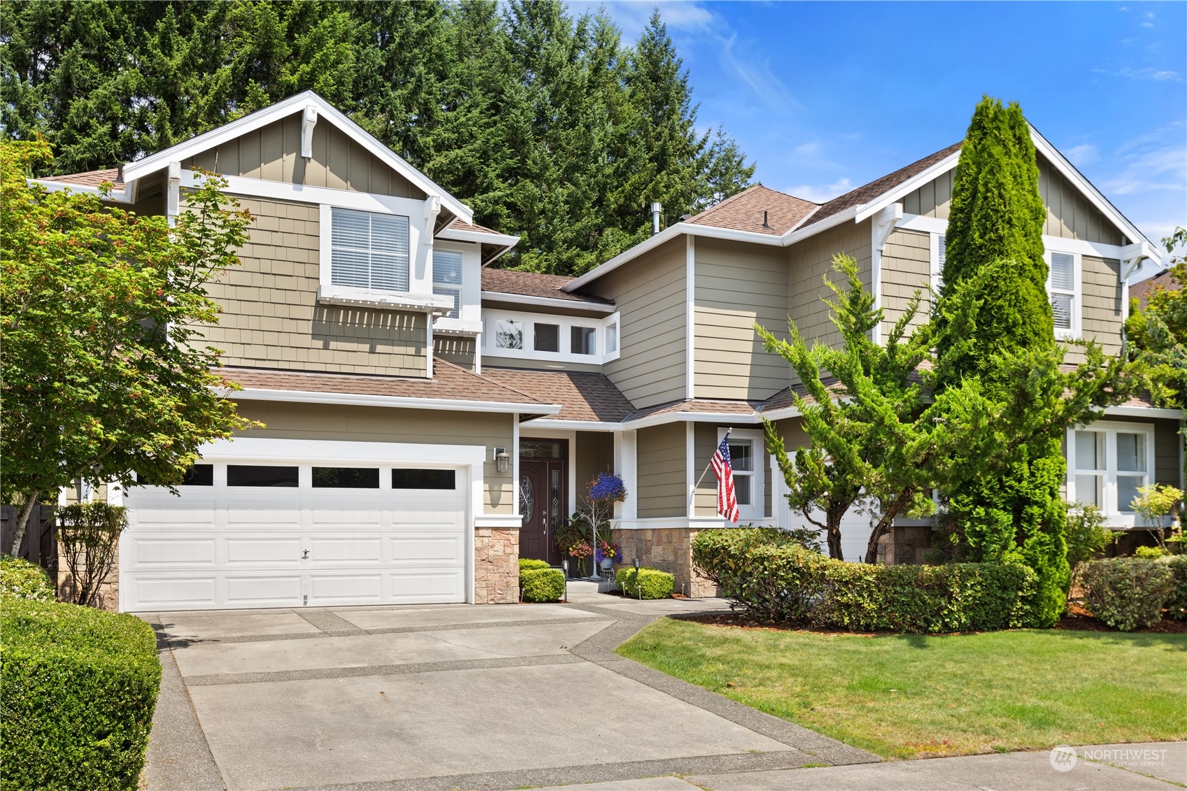 27746 Maple Ridge Way Southeast Maple Valley, WA 98038 - Photo 2 of 37 a view of a yard in front view of a house