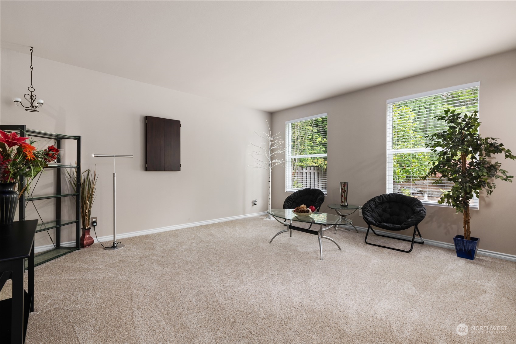 27746 Maple Ridge Way Southeast Maple Valley, WA 98038 - Photo 22 of 37 a living room with furniture and a window