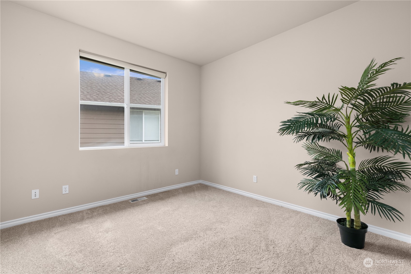 27746 Maple Ridge Way Southeast Maple Valley, WA 98038 - Photo 24 of 37 a view of an empty room with a window