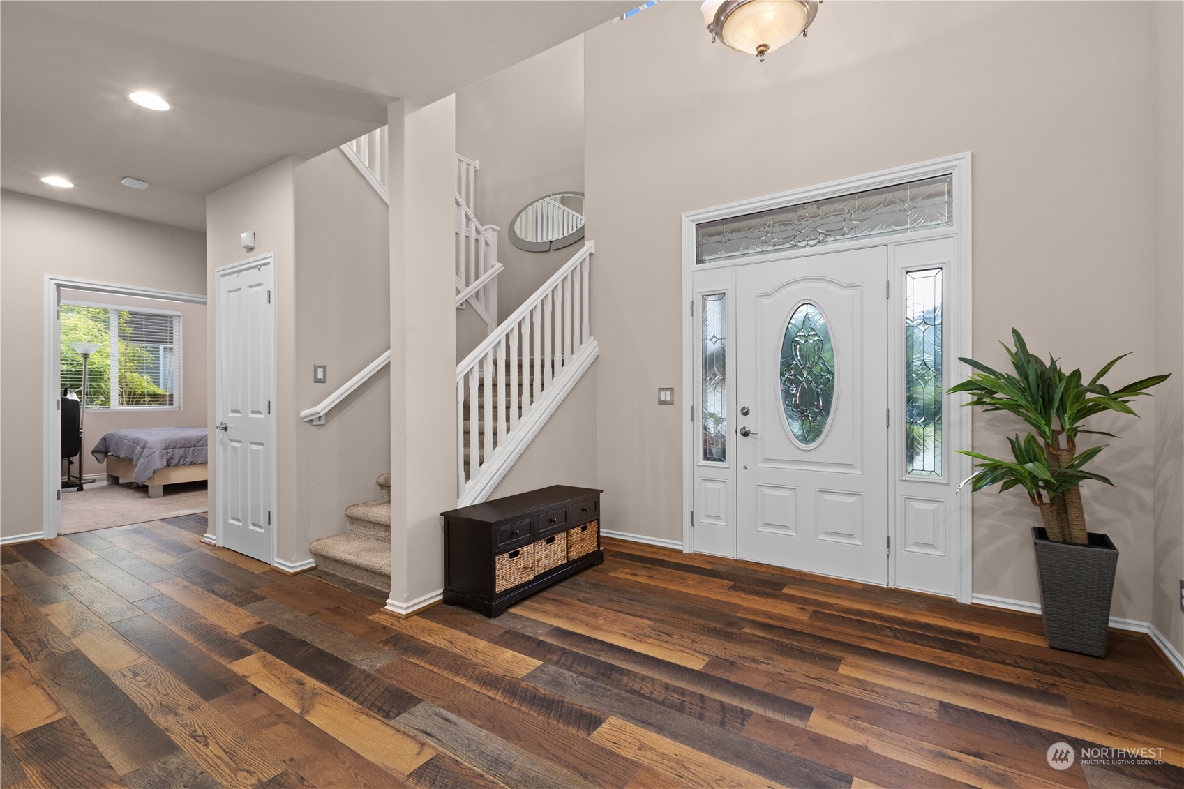 27746 Maple Ridge Way Southeast Maple Valley, WA 98038 - Photo 4 of 37 a view of entryway and hall with wooden floor