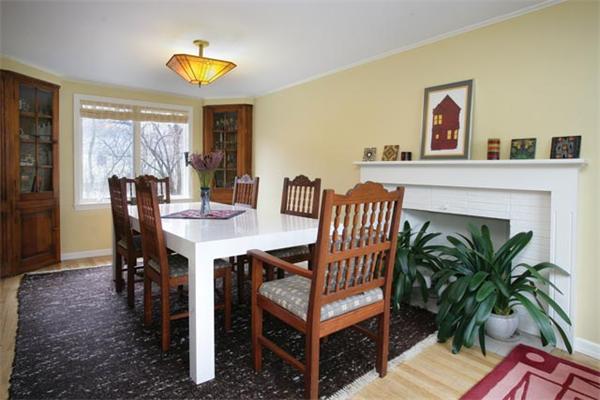 55 Truman Road Newton, MA 02459 - Photo 3 of 8 a view of a dining room with furniture window and wooden floor