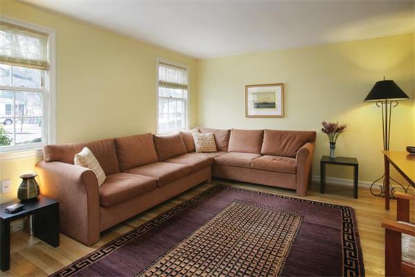 55 Truman Road Newton, MA 02459 - Photo 5 of 8 a living room with furniture and a couch