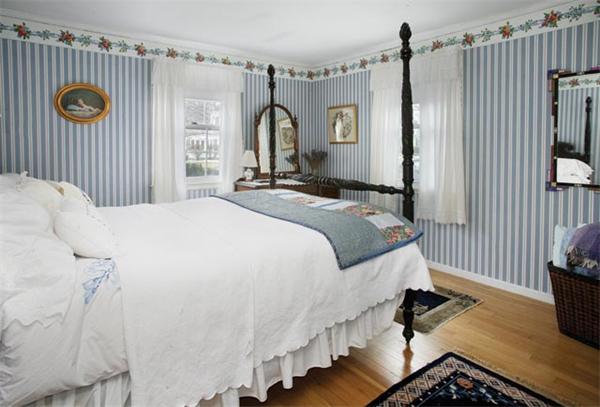 55 Truman Road Newton, MA 02459 - Photo 8 of 8 a spacious bedroom with a bed and a window
