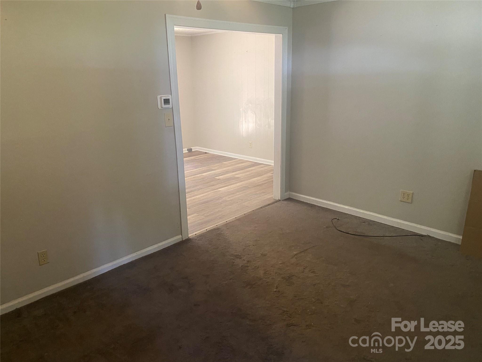 1427 Oak Hill Drive Morganton, NC 28655 - Photo 2 of 12 an empty room with an empty space