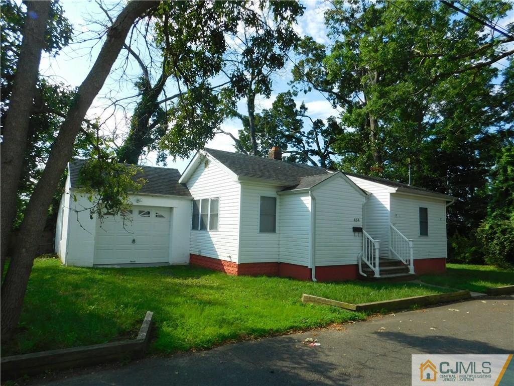 464 Harding Road Old Bridge, NJ 08879 - Photo 3 of 12 a view of a house with a yard and large trees