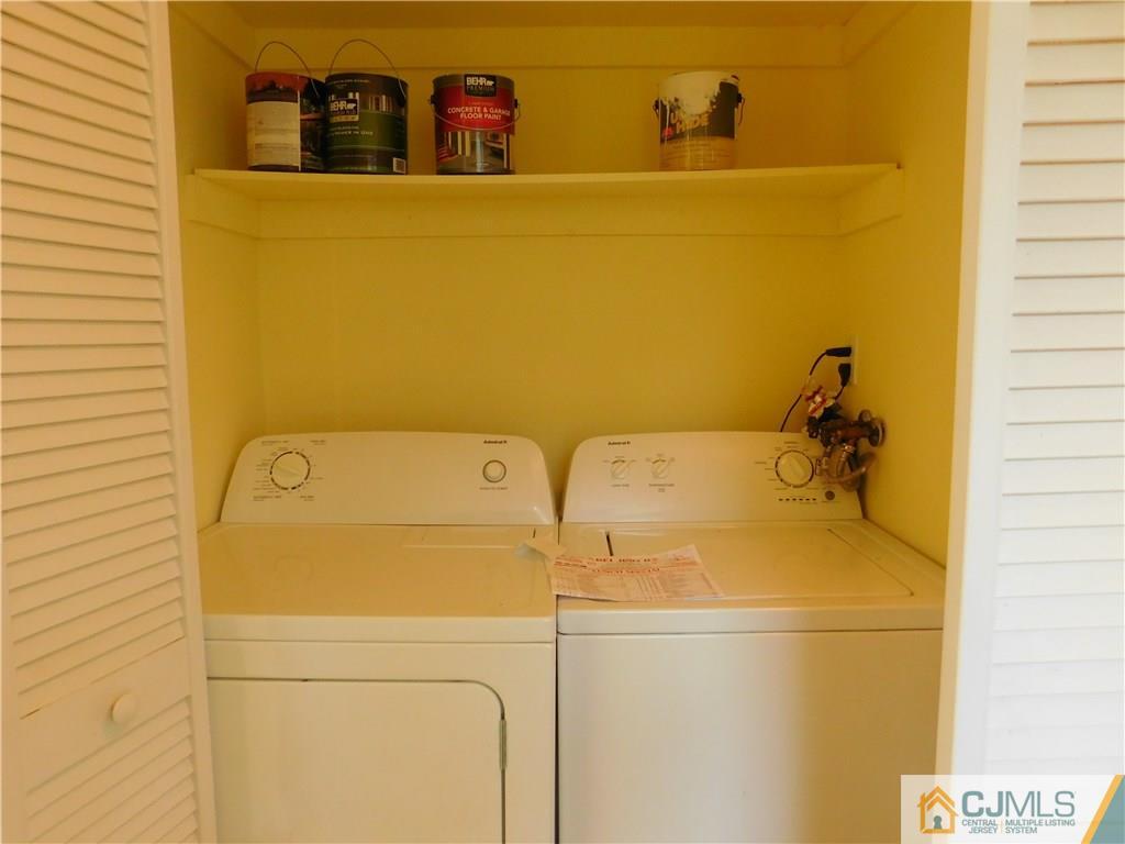 464 Harding Road Old Bridge, NJ 08879 - Photo 8 of 12 a utility room with dryer and washer