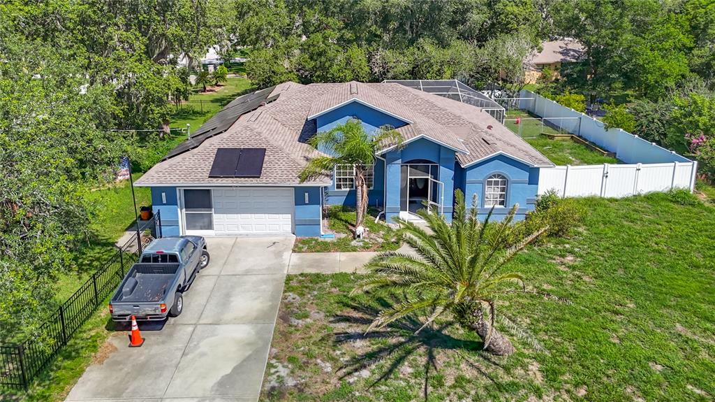 a house with trees in the background