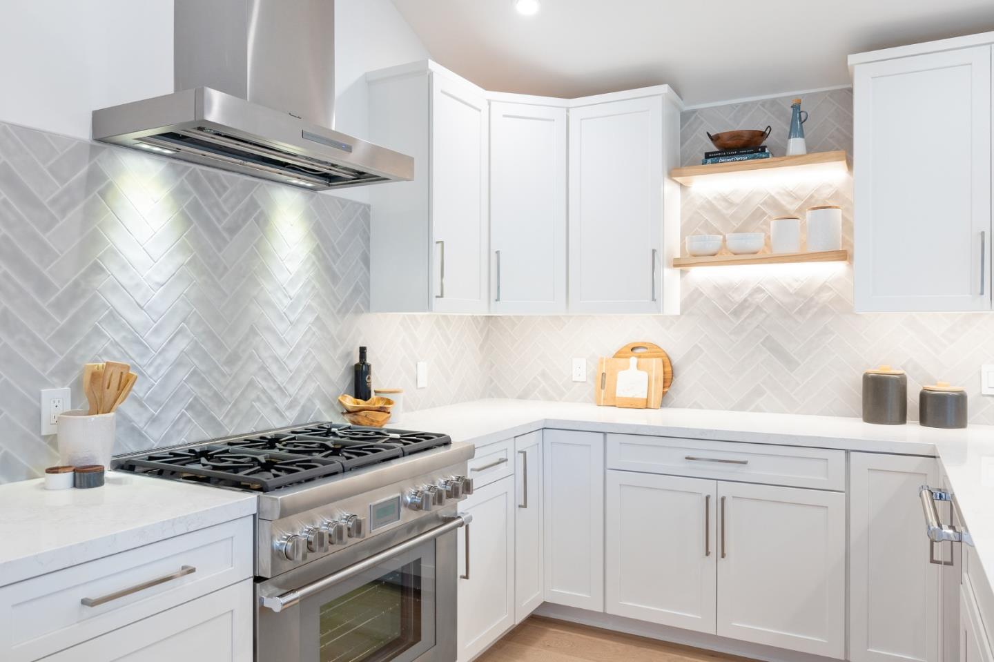 3130 Pico Avenue Carmel, CA 93923 - Photo 21 of 54 a kitchen with white cabinets and appliances