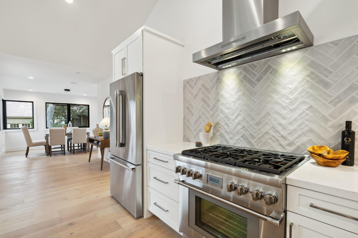 3130 Pico Avenue Carmel, CA 93923 - Photo 26 of 54 a kitchen with stainless steel appliances granite countertop a stove and a refrigerator