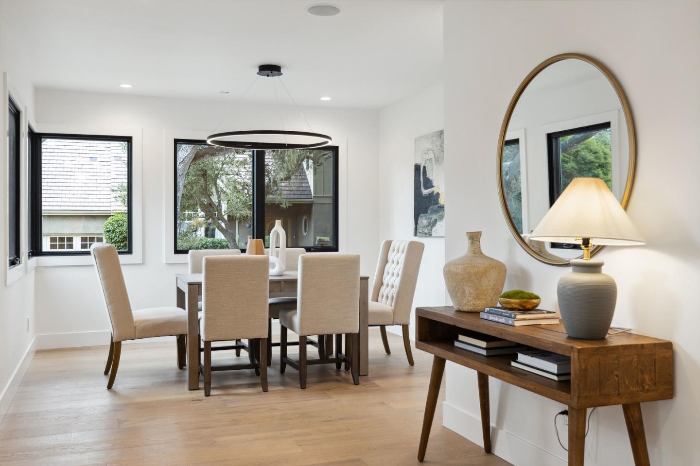 3130 Pico Avenue Carmel, CA 93923 - Photo 27 of 54 a view of a dining room with furniture window and wooden floor