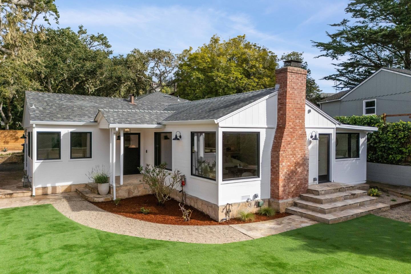 3130 Pico Avenue Carmel, CA 93923 - Photo 3 of 54 a view of a house with backyard porch and sitting area