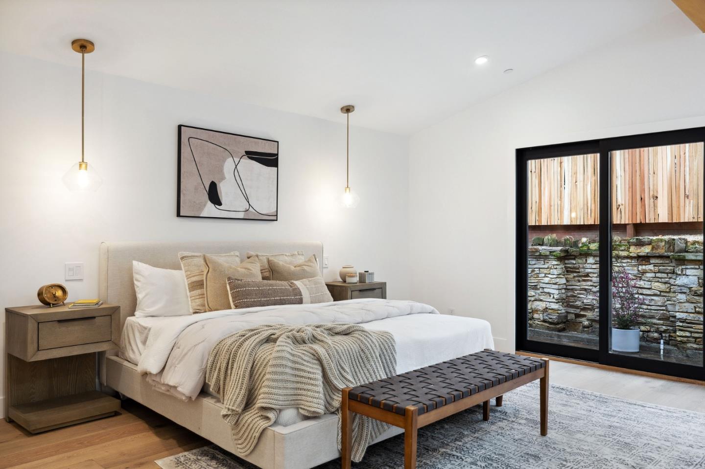 3130 Pico Avenue Carmel, CA 93923 - Photo 31 of 54 a bedroom with a bed a dresser and next to a window