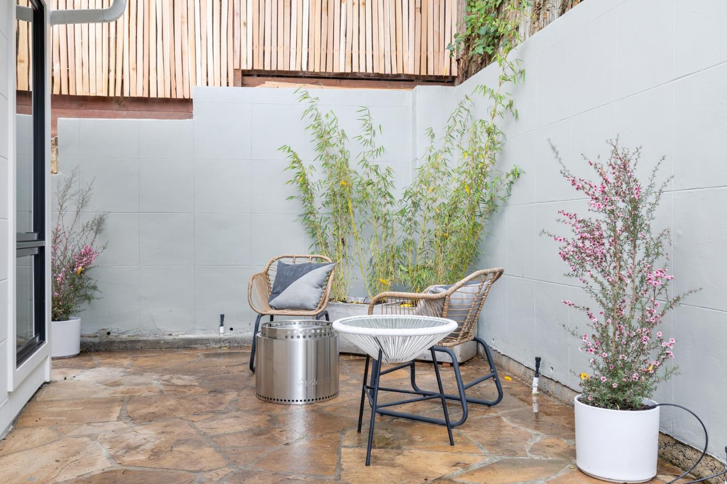3130 Pico Avenue Carmel, CA 93923 - Photo 35 of 54 a table and chairs in a patio
