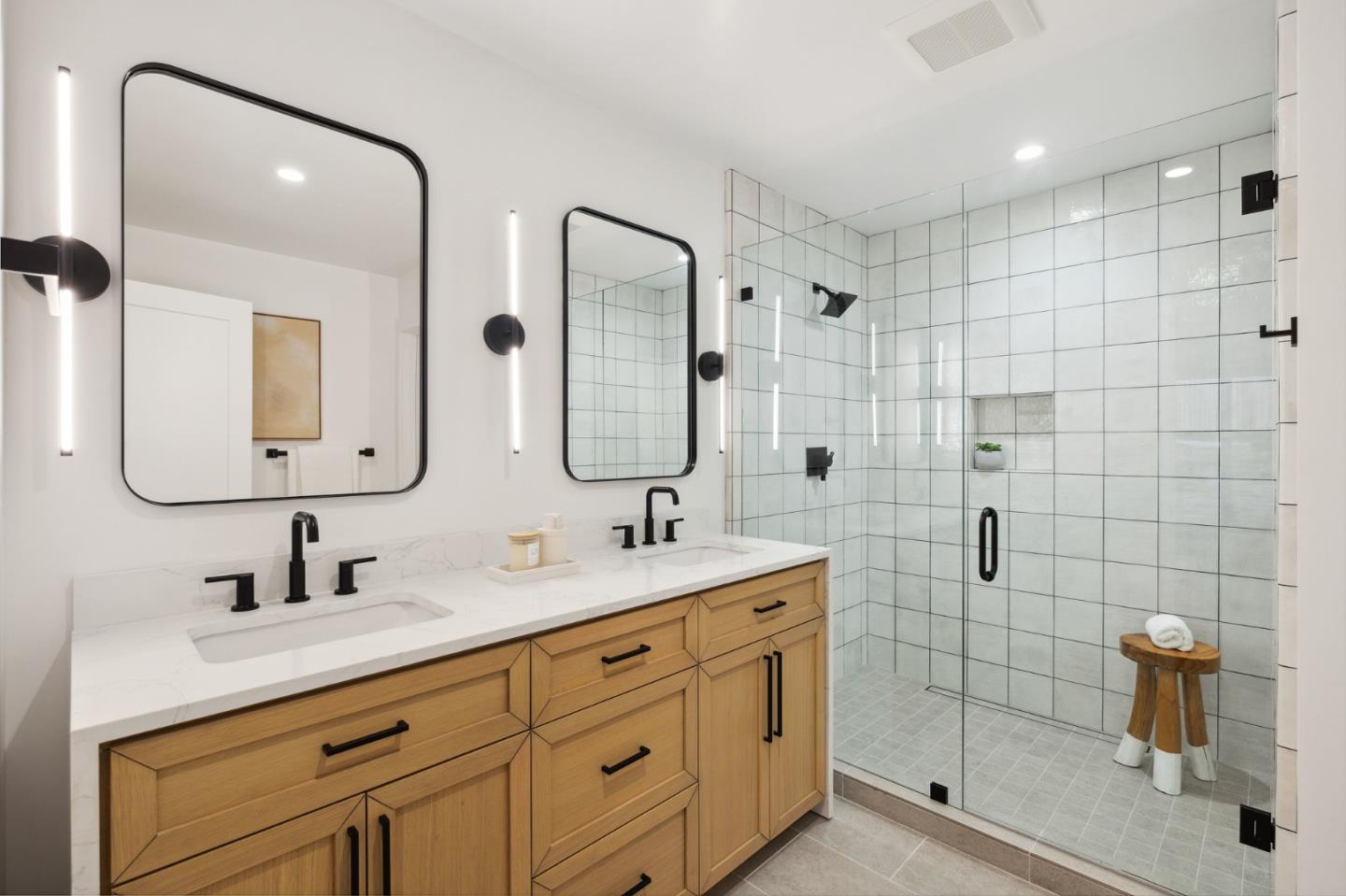 3130 Pico Avenue Carmel, CA 93923 - Photo 37 of 54 a bathroom with double vanity sinks double vanity shower and a mirror