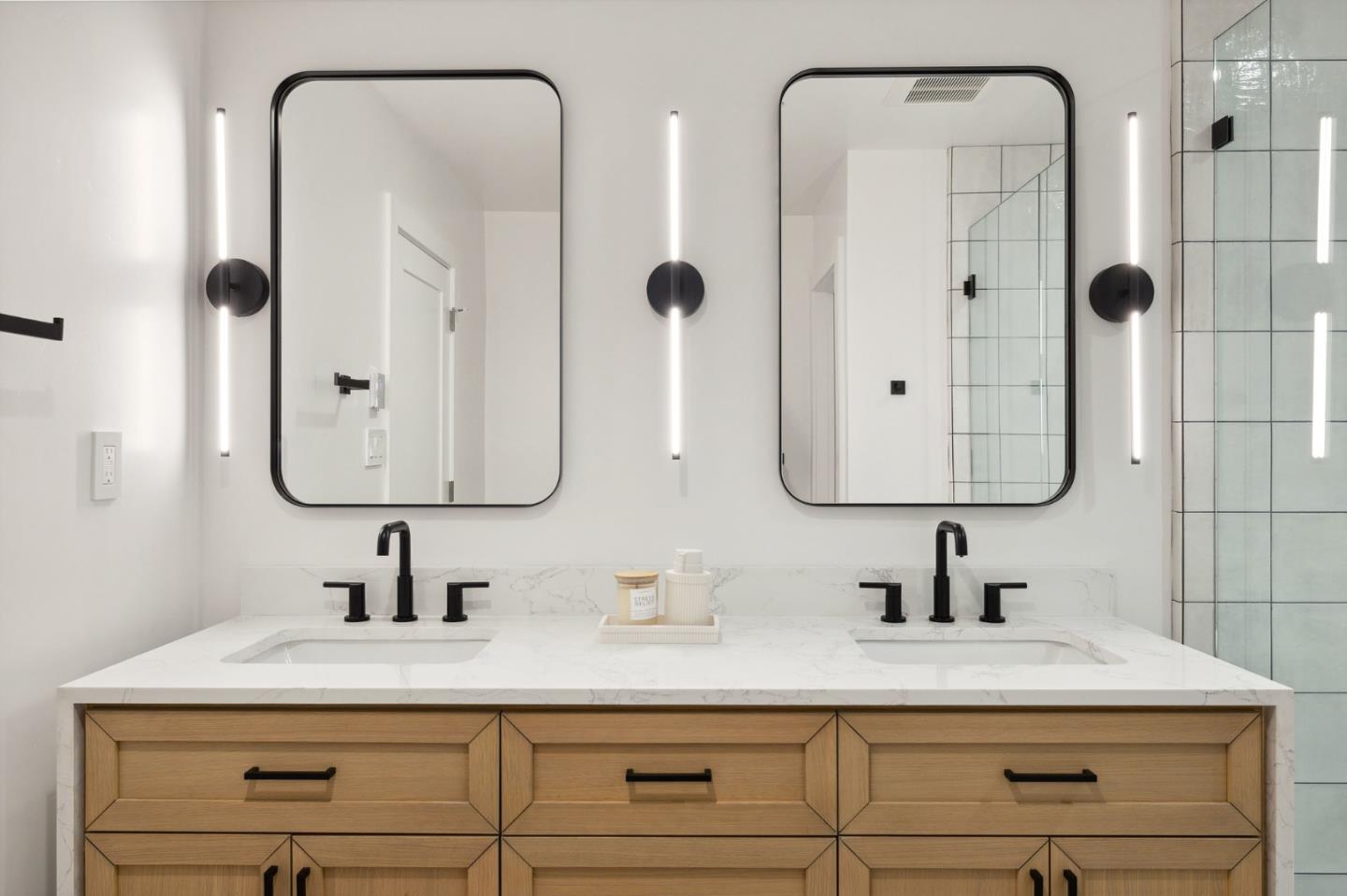 3130 Pico Avenue Carmel, CA 93923 - Photo 38 of 54 a bathroom with a double vanity sink mirror and