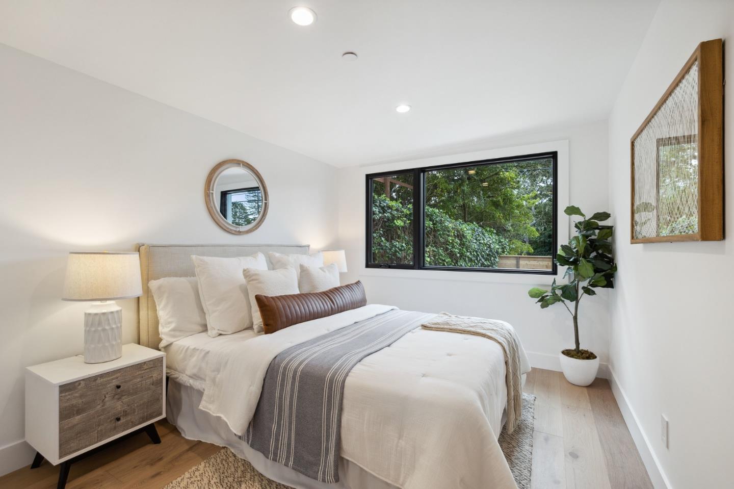 3130 Pico Avenue Carmel, CA 93923 - Photo 41 of 54 a bedroom with a large bed and a window