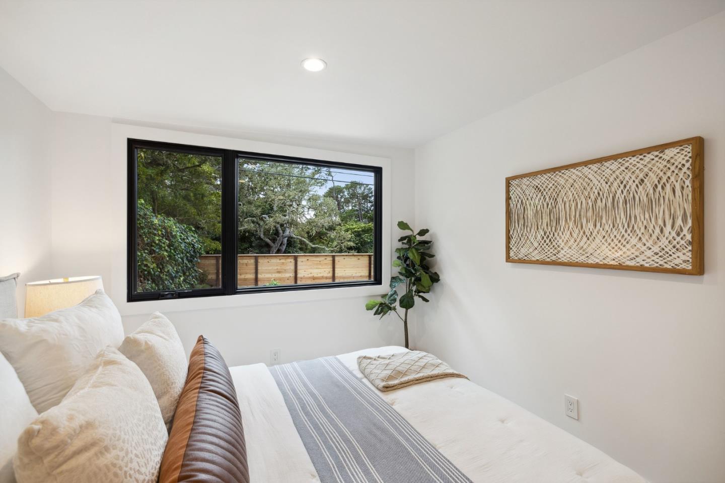 3130 Pico Avenue Carmel, CA 93923 - Photo 42 of 54 a bedroom with a bed and a large window