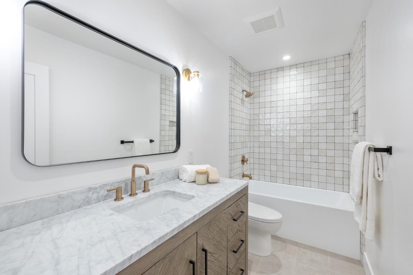 3130 Pico Avenue Carmel, CA 93923 - Photo 46 of 54 a bathroom with a granite countertop sink a toilet and shower