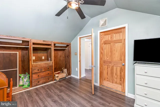 a view of a balcony with wooden floor