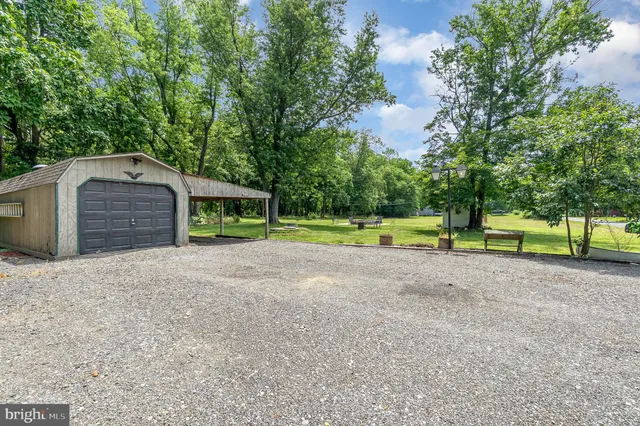 a house with trees in front of it