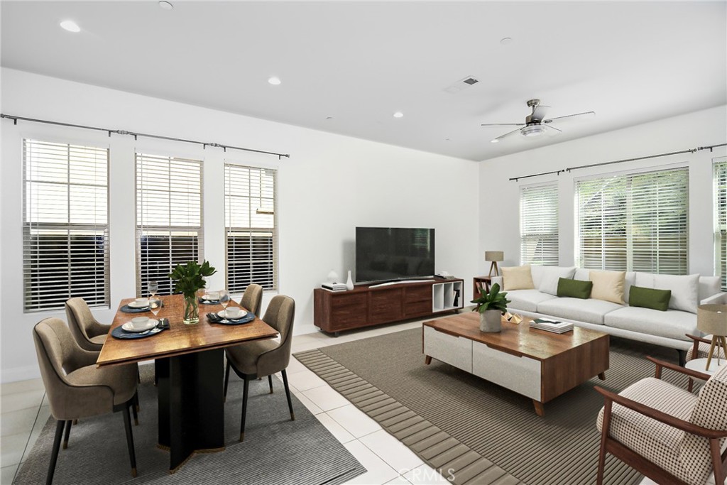 24336 Sterling Ranch Road West Hills, CA 91304 - Photo 12 of 40 a living room with furniture and a flat screen tv