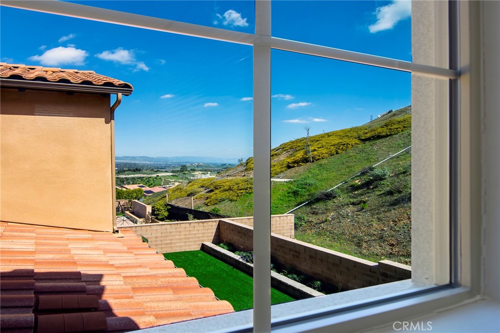 24336 Sterling Ranch Road West Hills, CA 91304 - Photo 20 of 40 a view of a balcony with an outdoor space