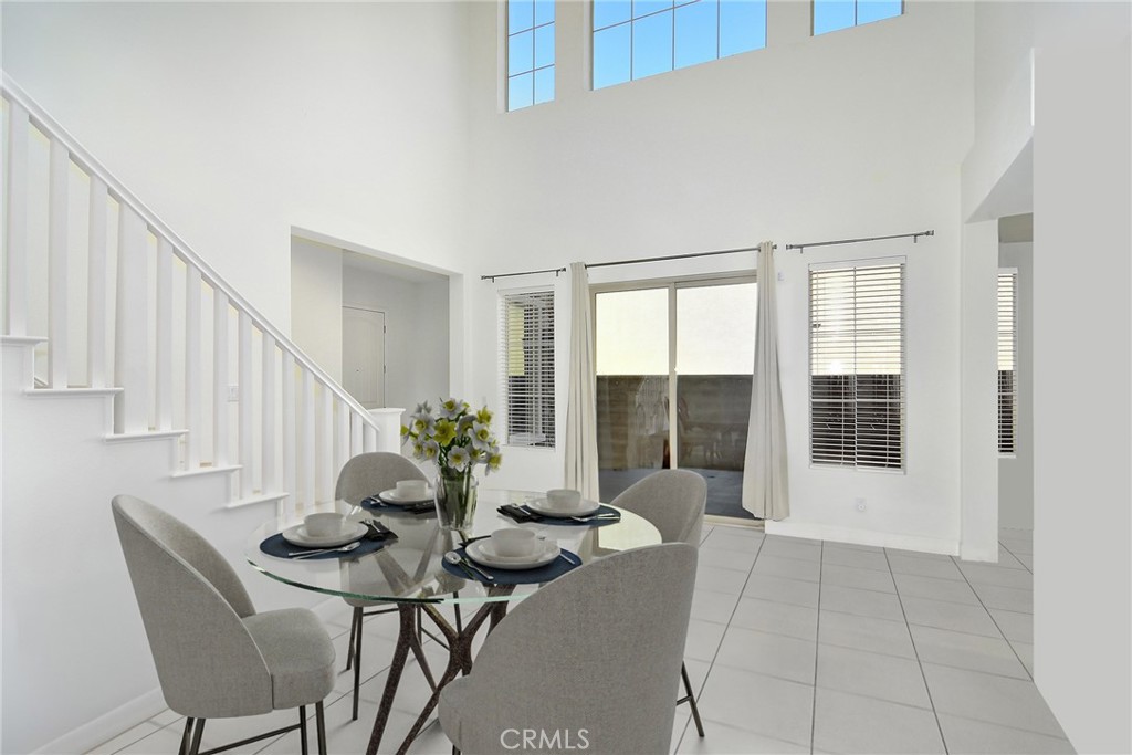 24336 Sterling Ranch Road West Hills, CA 91304 - Photo 9 of 40 a view of a livingroom with furniture and front door