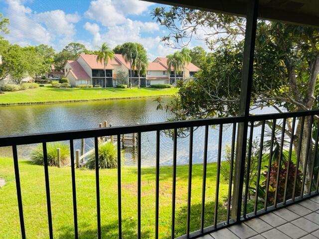 5621 Coach House Circle Boca Raton, FL 33486 - Photo 6 of 26 TRANQUIL LAKE VIEWS FROM BALCONY