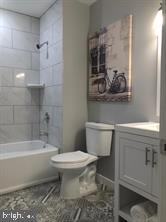 538 Newcomb Street Southeast Washington, DC 20032 - Photo 13 of 29 a bathroom with a toilet a sink and bathtub