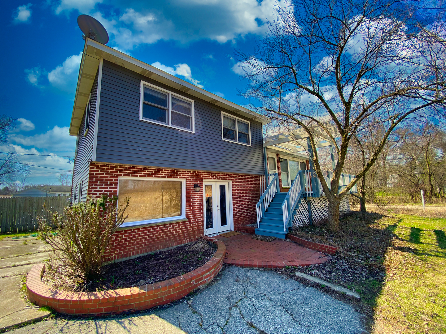 28939 May Street Spring Grove, IL 60081 - Photo 1 of 28 a view of a backyard with a fountain