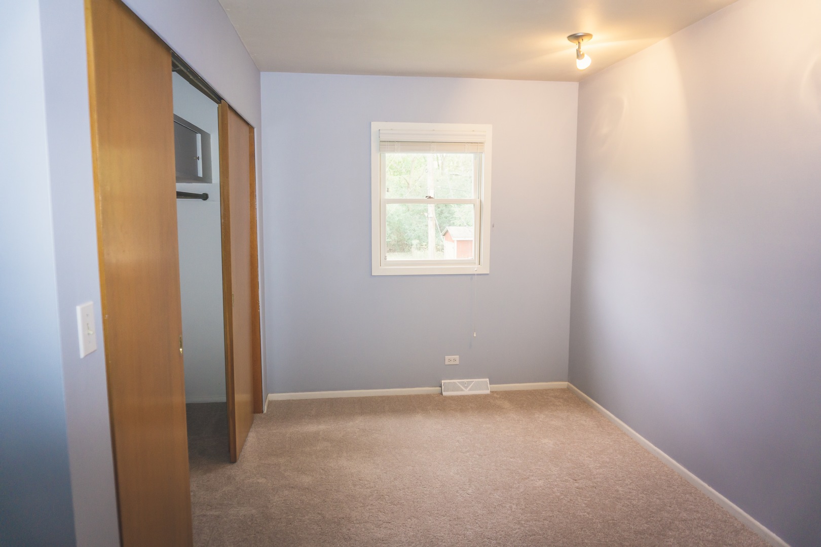 28939 May Street Spring Grove, IL 60081 - Photo 20 of 28 a view of an empty room with a window