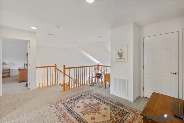 a view of a hallway with a bedroom