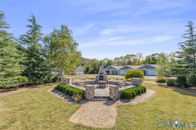a view of a patio with couches chairs and a table and chairs